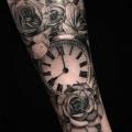 Arm Clock Flower tattoo by Endorfine Studio