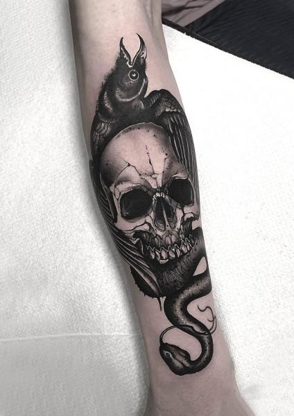 Arm Skull Crow Tattoo by Endorfine Studio