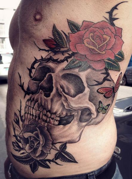 Flower Side Skull Tattoo by Løkka Tattoo Lounge