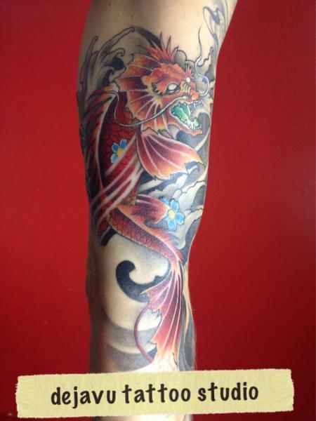 Arm Fantasy Dragon Tattoo by Dejavu Tattoo Studio