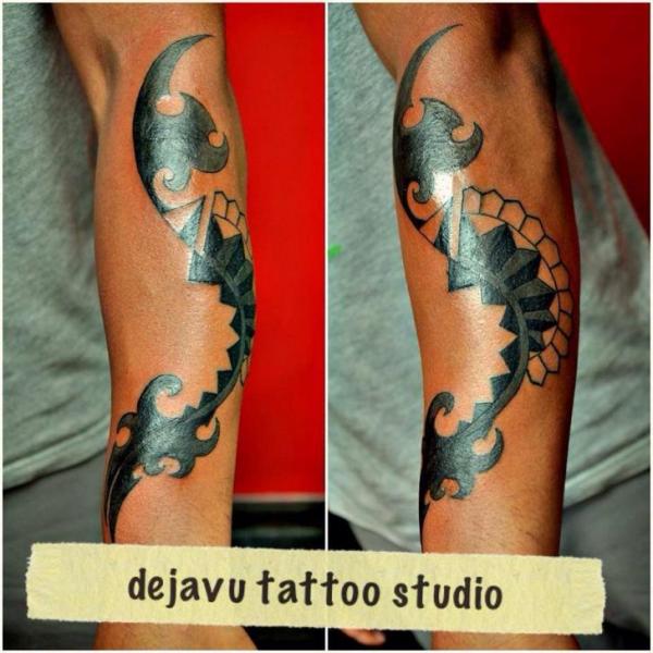 Arm Tribal Tattoo by Dejavu Tattoo Studio