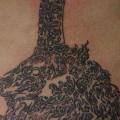 รอยสัก หลัง ชนเผ่า โดย Dejavu Tattoo Studio