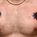 Brust Sonne Mond tattoo von Mad-art Tattoo