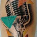 Arm Realistic Microphone tattoo by Gulestus Tattoo