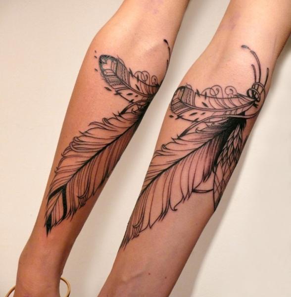 Arm Feather Tattoo by Supakitch