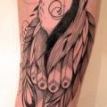 Arm Feather Wolf tattoo by Supakitch