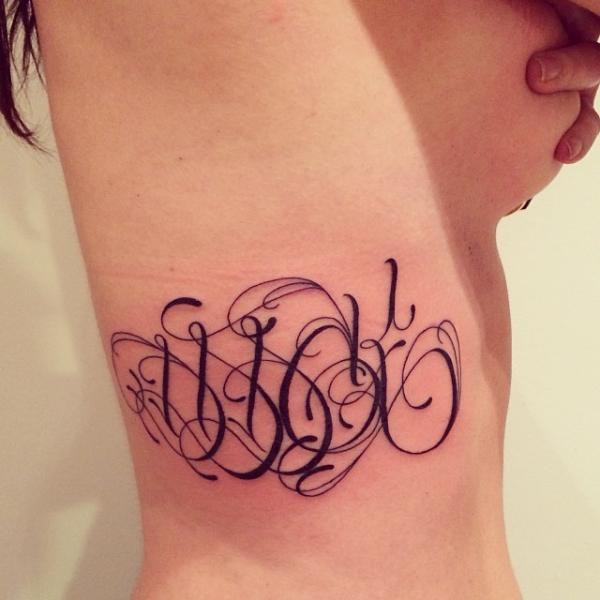 Side Lettering Tattoo by Supakitch