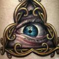 tatuaje Brazo Ojo Dios por Tattooed Theory