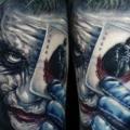 Arm Fantasy Joker tattoo by Tattooed Theory