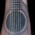 Arm Realistic Guitar tattoo by Jeremiah Barba