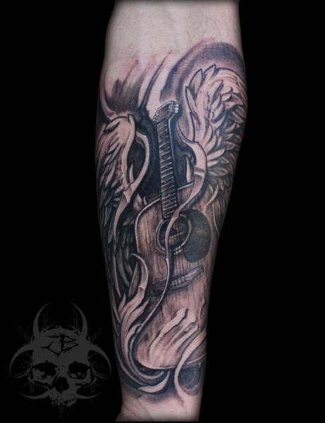 Arm Guitar Tattoo by Jeremiah Barba