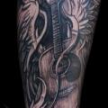 tatuaje Brazo Guitarra por Jeremiah Barba