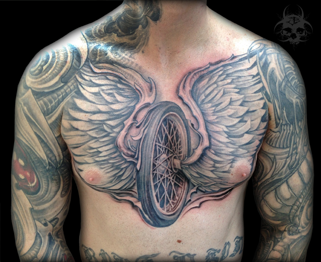 Chest Wings Wheel Tattoo by Jeremiah Barba