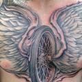 Chest Wings Wheel tattoo by Jeremiah Barba