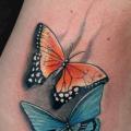 Realistic Side Butterfly tattoo by Black Ink Studio