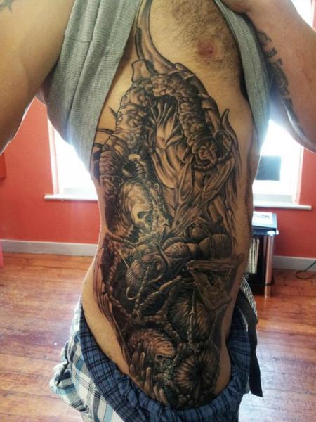 Tatuaje Lado Abstracto por Inky Joe