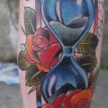 Calf Old School Flower Clepsydra tattoo by Marked For Life