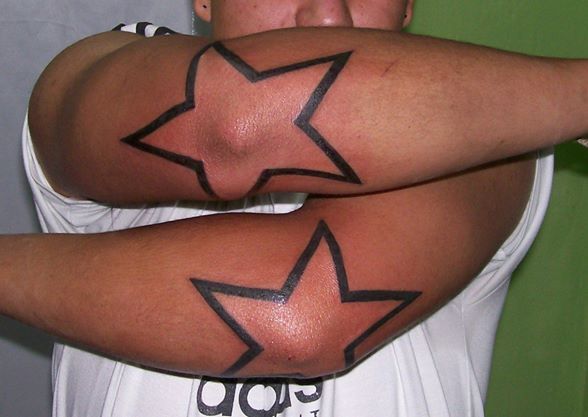 Tatuaggio Braccio Stelle di Dr Mortiis Tattoo Clinic