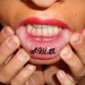 Lettering Mouth Lips tattoo by Dr Mortiis Tattoo Clinic