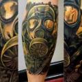 Realistic Calf Gun Gas Mask tattoo by Underworld Tattoo Supplies