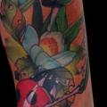 Arm Flower Ladybug tattoo by Piranha Tattoo Studio