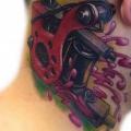 Neck Tattoo Machine tattoo by Piranha Tattoo Studio