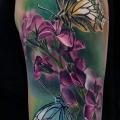 Shoulder Realistic Flower Butterfly tattoo by Piranha Tattoo Studio