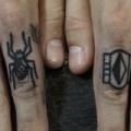 Finger tattoo by Philip Yarnell