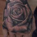 Realistic Flower Hand Rose tattoo by Pete the Thief