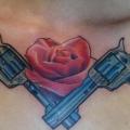 Blumen Waffen Brust tattoo von Electrographic Tattoo