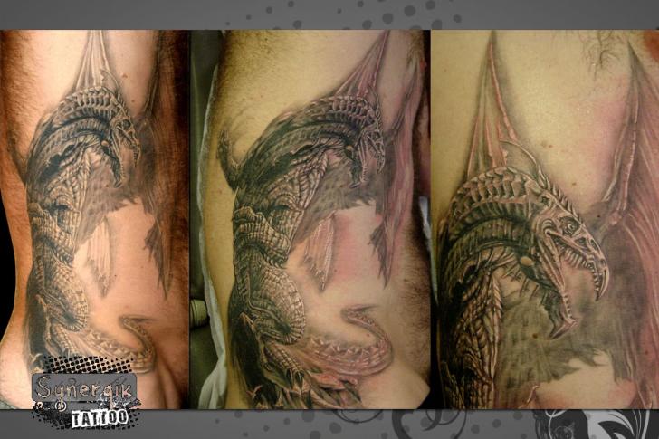 Fantasy Side Dragon Tattoo by Synergik Tattoo