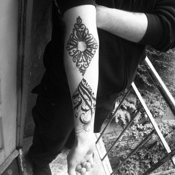 Arm Tribal Tattoo by Rock n Ink Tattoo