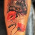 Arm Realistic Flower tattoo by Atrixtattoo