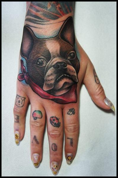 Dog Hand Tattoo by White Rabbit Tattoo