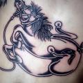 tatuaggio Pancia Cavalli di Hidden Moon Tattoo