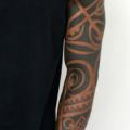 Tribal Sleeve tattoo by Chapel Tattoo
