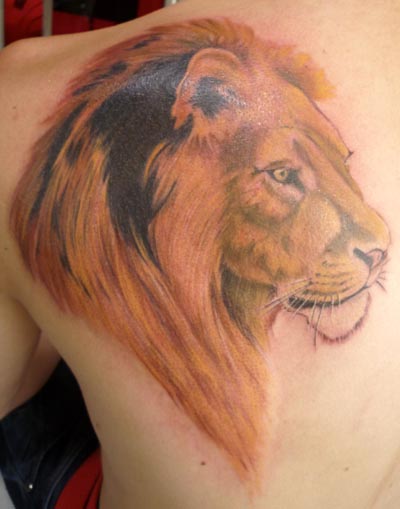 Realistic Back Lion Tattoo by Herzstich Tattoo