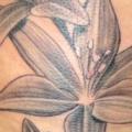 Realistic Flower tattoo by Herzstich Tattoo