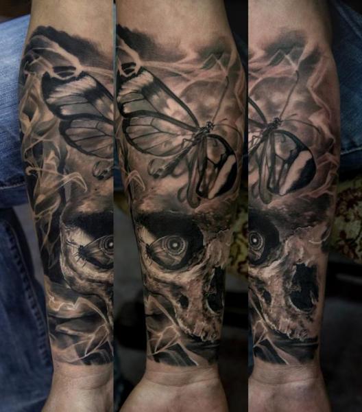 Arm Skull Butterfly Tattoo by Domantas Parvainis