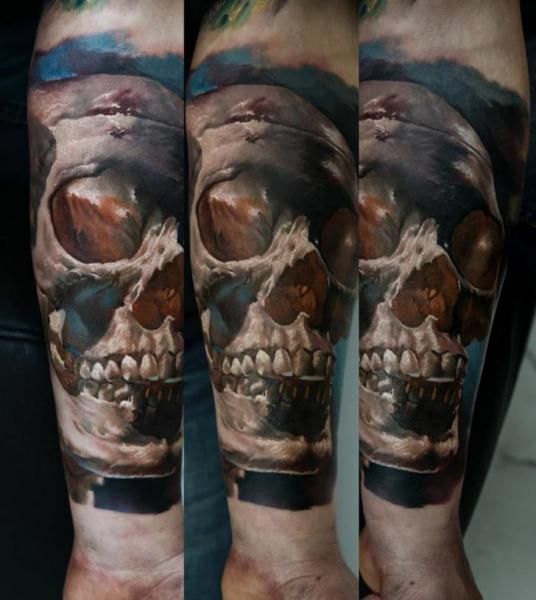 Arm Realistic Skull Tattoo by Domantas Parvainis