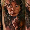 Portrait Thigh tattoo by Domantas Parvainis