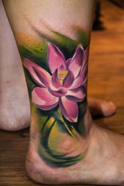 Leg Flower Lotus Tattoo by Pawel Skarbowski
