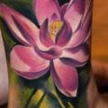Leg Flower Lotus tattoo by Pawel Skarbowski