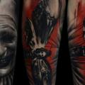 Arm Clown Motte tattoo von Redberry Tattoo