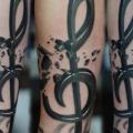 Music Note tattoo by Redberry Tattoo