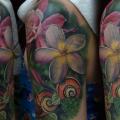 Shoulder Realistic Flower tattoo by Redberry Tattoo