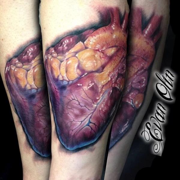 Arm Realistic Heart Tattoo by Powerline Tattoo