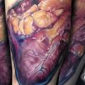 Arm Realistic Heart tattoo by Powerline Tattoo