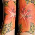 Arm Realistic Flower tattoo by Fade Fx Tattoo