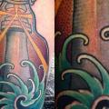 Arm Leuchtturm Flasche tattoo von Twisted Anchor Tattoo
